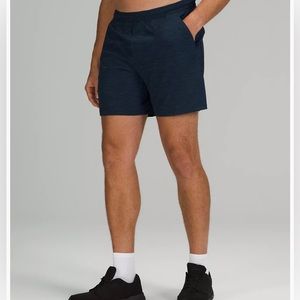 Mens Lululemon Pace Breaker Linerless Shorts. Size Medium. Heathered gray.